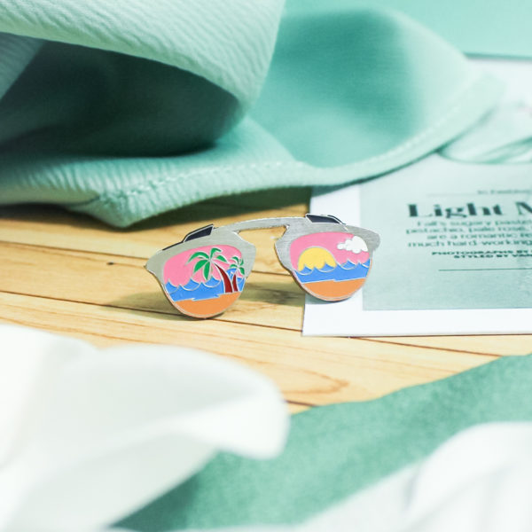 The Vacation Glass Pin is here for all the travelers out there, We've curated more lapel pins. Check out our online lapel pin store.
